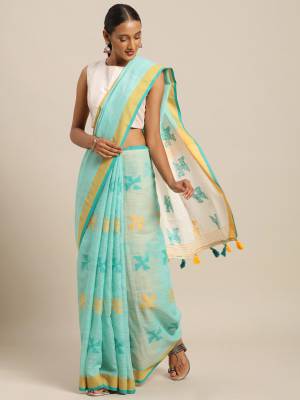 Rich And Elegant Looking Simple Saree Is Here For Your Semi-Casual Wear In Sky Blue Color Paired With Light Yellow Colored Blouse. This Saree and Blouse Are Fabricated On Linen Cotton. Its Color And Fabric Gives A Rich Look To Your Personality.  