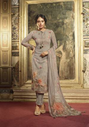 Flaunt Your Rich And Elegant Taste Wearing This Designer Straight Suit In Grey Color. Its Beautiful Top Is Fabricated On Georgette Paired With Santoon Fabricated Bottom And Chiffon Fabricated Dupatta. Buy This Pretty Suit Now. 