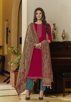 Get Ready For The Upcoming Festive Season With This Pretty Colorful Straight Suit In Dark Pink Colored Top Paired With Contrasting Blue colored Bottom And Light Brown Colored Dupatta. Its Top Is Muslin Based Paired With Cotton Bottom And Silk Handloom Dupatta. 