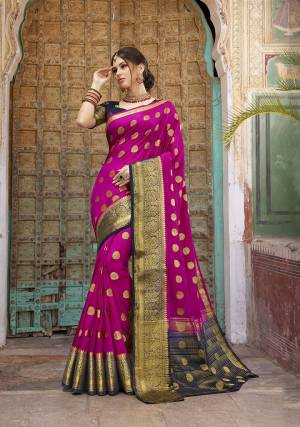 Look Attractive In This Pretty Dark Pink Colored Saree Paired With Navy Blue Colored Blouse. This Saree And Blouse Are Fabricated On Nylon Silk Beautified With Weave All Over. Buy This Saree Now.