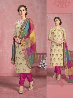 For Your Semi-Casuals, Get This Pretty Straight Suit In Beige Colored Top Paired With Dark Pink Colored Bottom And Mutli Dupatta. Its Top Is Fabricated On Cotton Paired With Semi Lawn Bottom and Banarasi Silk Dupatta. Buy This Semi-Stitched Suit Now.