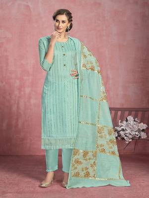 Here Is A Pretty Designer Dress Material In Turquoise Blue Colored Top Paired With Turquoise Blue Colored Bottom and Dupatta. Its Top Is Fabricated On Cotton Paired With Santoon Bottom And Fancy Dupatta. 