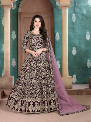 Get Ready For The Upcoming Wedding Season With This Attractive Looking Heavy Designer Floor Length Suit In Wine Color. This Pretty Heavy Embroidered Suit Is Fabricated On Georgette Paired With Santoon Bottom And Net Fabricated Dupatta. Its Bright Color And Heavy Embroidery Will Give An Attractive Look To Your Personality. 