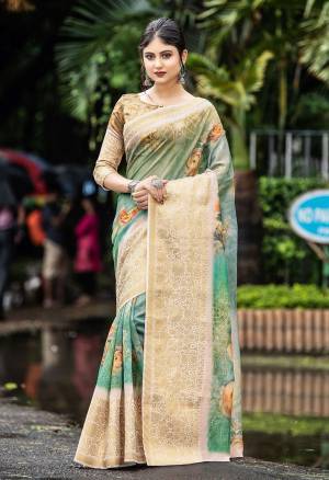 Simple And Elegant Looking Designer Saree Is Here In Teal Green Color Paired With Light Brown Colored Blouse. This Saree And Blouse Are Fabricated On Cotton Beautified With Print And Weave. Buy This Saree Now.