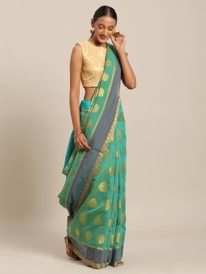 For Your Semi-Casual Wear, Grab This Saree In Light Green Color Paired With Contrasting Sky Blue Colored Blouse. This Pretty Weaved Saree and Blouse Are cotton Handloom. 