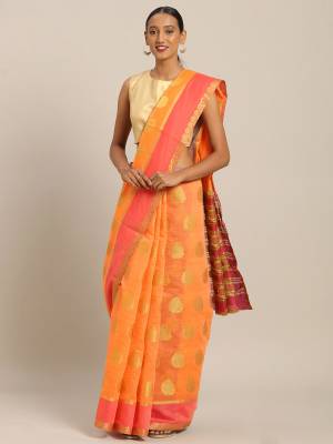 Pretty Simple And Elegant Looking Saree For Your Semi-Casual Wear Is Here In Orange color Paired With Contrasting Dark Pink Colored Blouse. This Saree and Blouse Are Fabricated On Cotton Handloom Beautified With Weave. 