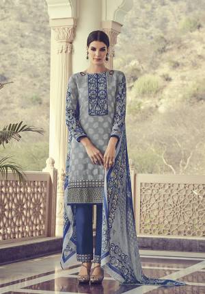 Flaunt Your Rich And Elegant Taste Wearing This Pretty Designer Straight Suit In Grey And Blue Color. Its Top IS Georgette Jacquard Based Paired With Santoon Bottom and Chiffon Dupatta. Its Fabrics Are Light Weight And Easy To Carry All Day Long. 
