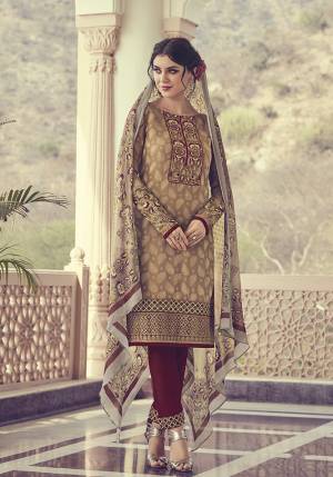 Flaunt Your Rich And Elegant Taste Wearing This Pretty Designer Straight Suit In Brown and Maroon Color. Its Top IS Georgette Jacquard Based Paired With Santoon Bottom and Chiffon Dupatta. Its Fabrics Are Light Weight And Easy To Carry All Day Long. 