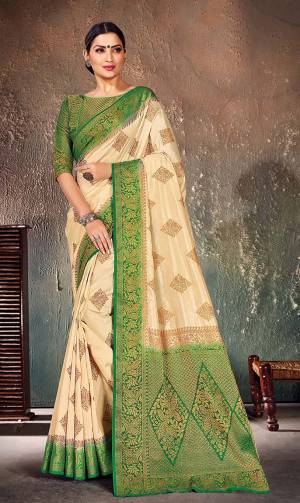 Look Attractive In This Pretty Cream Colored Saree Paired With Green Colored Blouse. This Saree And Blouse Are Fabricated On Nylon Silk Beautified With Weave All Over. Buy This Saree Now.?