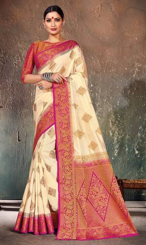 Adorn A Proper Traditional Look Wearing This Designer Silk Based?Saree In Cream Color Paired With Dark Pink Colored Blouse. This Saree And Blouse Are Fabricated On Nylon Silk Beautified With Weave