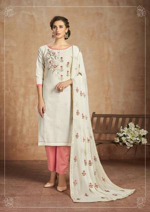 Grab This Pretty Cotton Based Dress Material In Off-White Colored Top Paired With Dark Peach Colored Bottom and Off-White Dupatta. This Straight Suit Can Be Customised As Per Your Desired Fit and Comfort. 