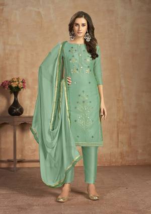 For your Semi-Casual Wear, Here Is A Pretty Straight Suit In Sea Green Color. This Pretty Suit Is Cotton Based Beautified With Thread Work. Buy This Dress Material Now.