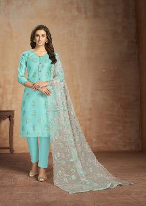 Grab This Pretty Cotton Based Dress Material In Turquoise Blue Color Paired With White Colored Dupatta. This Straight Suit Can Be Customised As Per Your Desired Fit and Comfort. 