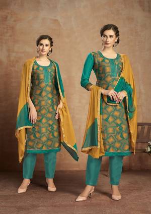 For your Semi-Casual Wear, Here Is A Pretty Straight Suit In Teal Geeen And Musturd Yellow Color. This Pretty Suit Is Cotton Based Beautified With Thread Work. Buy This Dress Material Now.