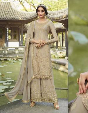 Get Ready For The Upcoming Wedding And Festive Season With This Beautified Designer Straight Suit In Pale Grey Color. Its Top Is Chinon Based Paired With Georgette Bottom and Dupatta. Its Fabrics Are Light Weight And Easy To Carry Throughout The Gala. 