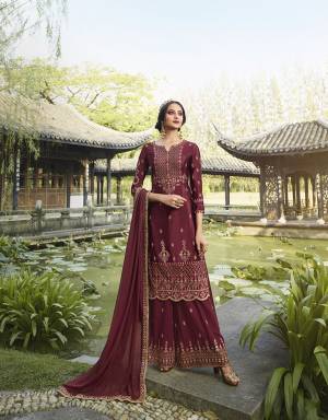 Attract All Wearing This Designer Suit In Maroon Color. Its Pretty Top Is Fabricated On Chinon Paired With Georgette Fabricated Bottom and Dupatta. This Suit's Top, Bottom And Dupatta Are Beautified With Detailed Heavy Embroidery. Buy This Pretty Piece Now. 