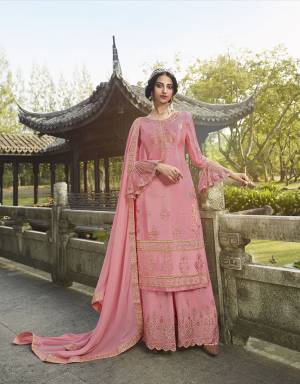 Attract All Wearing This Designer Suit In Pink Color. Its Pretty Top Is Fabricated On Chinon Paired With Georgette Fabricated Bottom and Dupatta. This Suit's Top, Bottom And Dupatta Are Beautified With Detailed Heavy Embroidery. Buy This Pretty Piece Now. 
