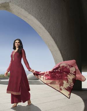 Rich And Elegant Looking Designer Straight Suit Is Here In Maroon Color. Its Pretty Top Is Crepe Based Paired With Santoon Bottom And Chiffon Dupatta.It Is Beautified With Prints And Attractive Embroidery. 