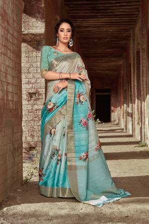 Flaunt Your Rich And Elegant Taste Wearing This Designer Digital Printed Saree In Blue And Grey Color. This Saree And Blouse Are Fabricated On Satin Silk Giving A Rich Look To Your Personality. 
