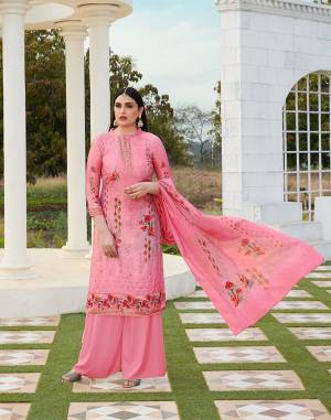 Here Is A Very Pretty Designer Straight Suit In Pink Color. Its Top Is Fabricate On Cotton Silk Paired With Cotton Bottom And Soft Cotton Dupatta. This Pretty Suit Is Beautified With Digital Print And Tone To Tone Thread Work. It Is Light In Weight And Easy To Carry All Day Long. 