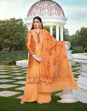 Flaunt Your Rich And Elegant Taste In This Lovely Designer Straight suit In Orange color. Its Top Is Cotton Silk Based Paired With Cotton Bottom And Soft Cotton Dupatta. It Has Elegant Tone To Tone Thread Work With Digital Print.