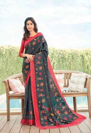 Her Is A Very Pretty Light Weight Designer Printed Saree In Dark Grey Color. This Saree And Blouse Are Fabricated On Kora Satin Which Is Soft Towards Skin And Easy To Carry All Day Long. 