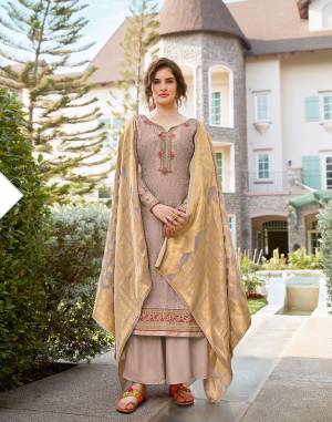 Flaunt Your Rich And Elegant Taste Wearing This Heavy Designer Straight Suit In Grey Color. Its Heavy Embroidered Top IS Fabricated On Tussar Art Silk Paired With Santoon Bottom and Jacquard Silk Fabricated Dupatta. 