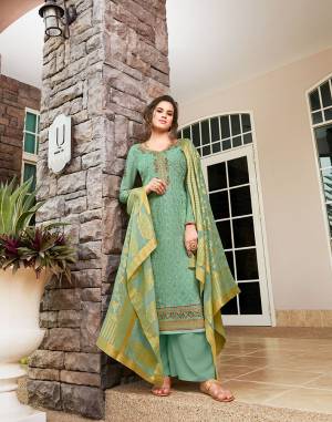 Add This Very Pretty Designer Straight Suit To Your Wardrobe In Sea Green Color. Its Top Is Fabricated On Tussar Art Silk Beautified With Heavy Embroidery Paired With Santoon Bottom and Jacquard Silk Fabricated Dupatta. 