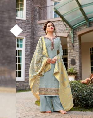 Add This Very Pretty Designer Straight Suit To Your Wardrobe In Steel Blue Color. Its Top Is Fabricated On Tussar Art Silk Beautified With Heavy Embroidery Paired With Santoon Bottom and Jacquard Silk Fabricated Dupatta. 