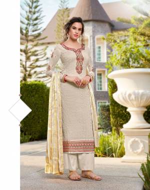 Look Pretty In This Attractive Looking Designer Straight Suit In Off- White Color. Its Top Is Fabricated On Tussar Art Silk Paired With Santoon Bottom And Jacquard Silk Fabricated Dupatta. Buy Now. 