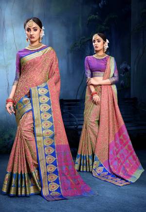 For A Proper Traditional Look, Grab This Pretty Saree In Light Green And Pink Color Paired With Purple Colored Blouse. This Saree Is Fabricated On Cotton Silk Paired With Art Silk Fabricated Blouse. Buy This Saree Now.