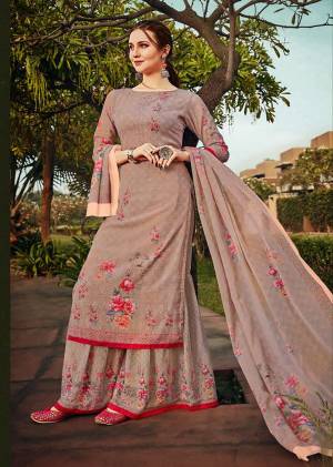 Grab This Pretty Designer Straight Suit In All Over Mauve Color. Its Pretty Top, Bottom And Dupatta Are Fabricated On Georgette Beautified With Prints And Stone Work. It Is Light In Weight And Easy To Carry All Day Long. 