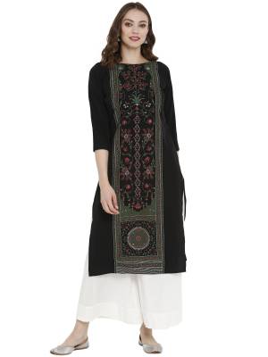 For Your Semi-Casual Wear, Grab This Readymade Straight Kurti In Black Color Fabricated On Crepe. It Is Beautified With Prints And Can Be Paired With Same Or Contrasting Colored Leggings, Pants Or Plazzo. 