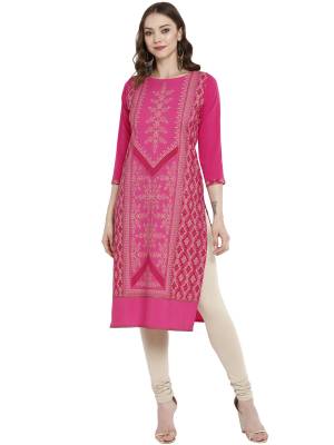 For Your Semi-Casual Wear, Grab This Readymade Straight Kurti In Rani Pink Color Fabricated On Crepe. It Is Beautified With Prints And Can Be Paired With Same Or Contrasting Colored Leggings, Pants Or Plazzo. 