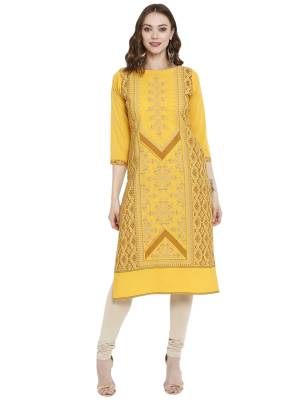 Must Have Casual Kurti Is Here In Yellow Color Fabricated On Crepe. This Straight Kurti Is Beautified With Prints And It Is Light Weight, Durable And Easy To Care For. Buy Now.