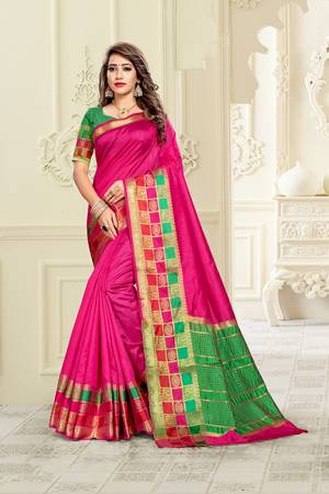 Celebrate This  Festive Season With Beauty And Comfort Wearing This Designer Saree In Rani Pink color Paired With Contrasting Green Colored Blouse. This Saree Is Fabricated On Cotton Silk Paired With Art Silk Fabricated Blouse. 