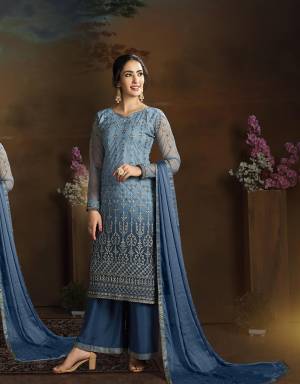 Look Pretty In This Very Beautiful Heavy Designer Straight Suit In Blue Color. Its Top Is Fabricated On Net Paired With Silk Based bottom And Chiffon Dupatta. This Pretty Suit IS Suitable For Festive, Wedding Occasion Wear. Buy Now.