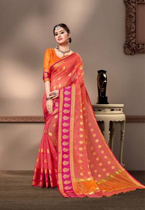Pretty Simple And Elegant Looking Saree Is Here In Dark Peach Color Paired With Orange Colored Blouse. This Saree And Blouse Are Fabricated On Cotton Silk Beautified With Weave. 