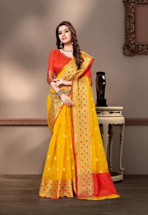 For Your Semi-Casual Wear, Grab This Pretty Saree In Yellow Color Paired With Orange Colored Blouse. This Saree And Blouse Are Fabricated On Cotton Silk Beautified With Weave. Buy This Saree Now.