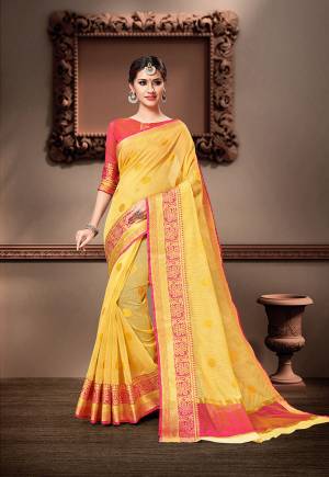 Pretty Simple And Elegant Looking Saree Is Here In Yellow Color Paired With Pink Colored Blouse. This Saree And Blouse Are Fabricated On Cotton Silk Beautified With Weave. 