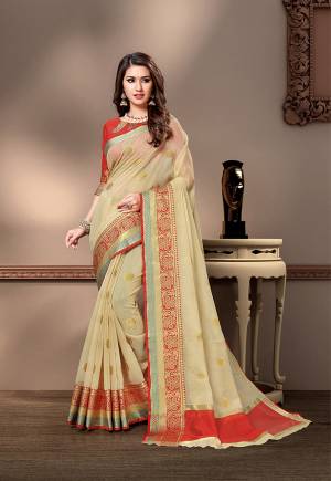 For Your Semi-Casual Wear, Grab This Pretty Saree In Pastel Green Color Paired With Red Colored Blouse. This Saree And Blouse Are Fabricated On Cotton Silk Beautified With Weave. Buy This Saree Now.