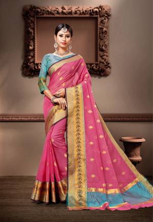 Pretty Simple And Elegant Looking Saree Is Here In Pink Color Paired With Blue Colored Blouse. This Saree And Blouse Are Fabricated On Cotton Silk Beautified With Weave. 