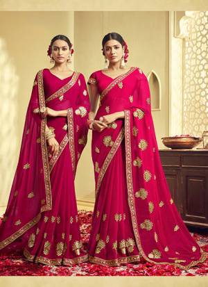 Catch All The Limelight Wearing This Pretty Designer Saree In Rani Pink Color. This Saree And Blouse Are Georgette Based Beautified With Attractive Jari Work. Buy This Pretty Saree Now. 