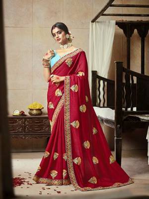 Add This Very Pretty Attractive Looking Designer Saree To Your Wardrobe In Dark Pink Color Paired With Contrasting Sky Blue Colored Blouse. This Saree Is Fabricated On Satin Silk Paired With Art Silk Fabricated Blouse. 
