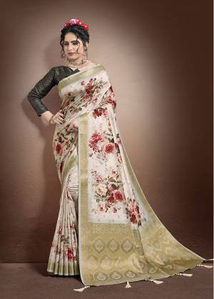 You Will Definitely Earn Lots Of Compliments Wearing This Designer Saree In Off-White Color Paired With Dark Grey Colored Blouse. This Saree and Blouse Are Fabricated On Jacquard Silk Beautified With Weave And Digital Print. Buy Now.