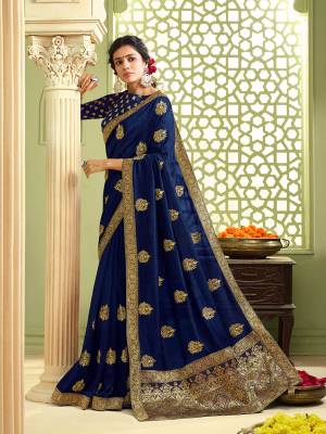 Flaunt Your Rich And Elegant Taste Wearing This Pretty Saree In Navy Blue Color. This Saree and Blouse Are Silk Based Which Gives A Rich Look To Your Personality, Buy Now.