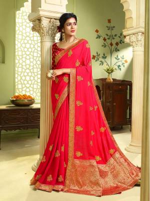 Flaunt Your Rich And Elegant Taste Wearing This Pretty Saree In Rani Pink Color. This Saree and Blouse Are Silk Based Which Gives A Rich Look To Your Personality, Buy Now.