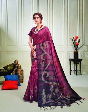 Breathe into the glory like that of a queen in this vibrant magenta pink saree enhanced with metallic foil details and swarvoski crystals. Drape it in a classsic falling pallu drape to look ethereal. 