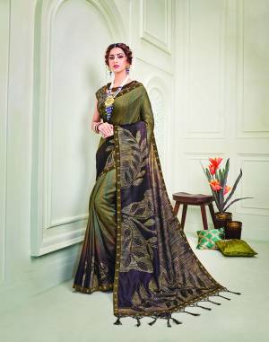 Personify exquisiteness in this shaded two-tone saree perfected with metallic foil foil leaf motifs. Pair with a contrasting long maharani style necklace to give an added playful touch.  