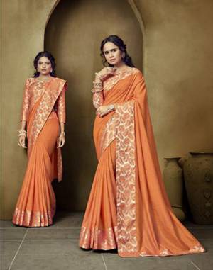 Simple and Elegant Looking Saree Is Here In Orange Color. This Plain Saree Has Weaved Broad Border. This Saree Is Fabricated On Art Silk Paired With Brocade Fabricated Blouse. Buy Now. 